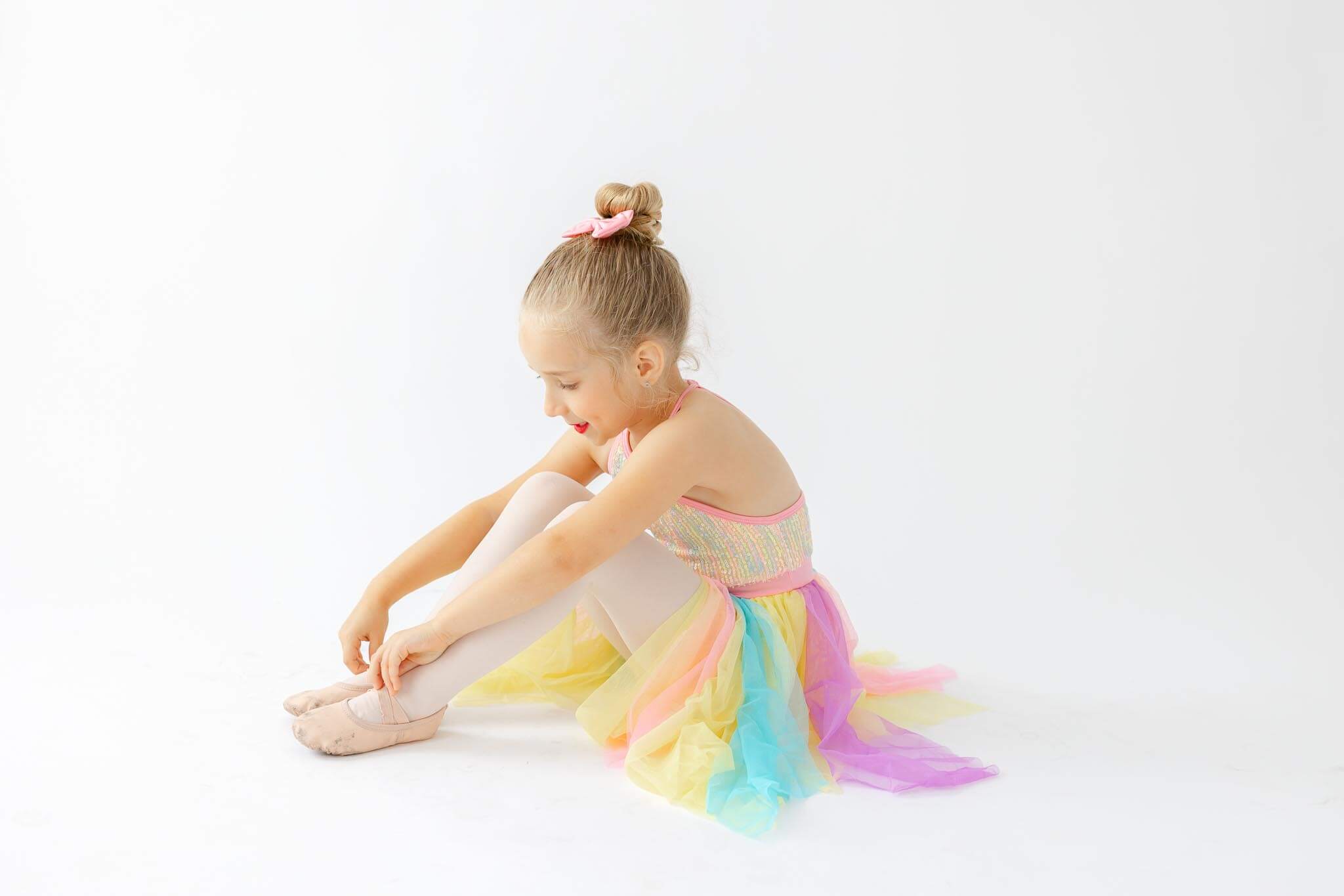 Child playing with her ballet slippers in Springfield, Ga